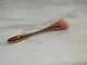 Rose gold cleaning brush