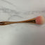 Rose gold cleaning brush